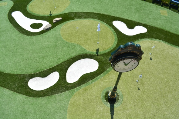 Vancouver Synthetic grass golf course with sand traps and golfers